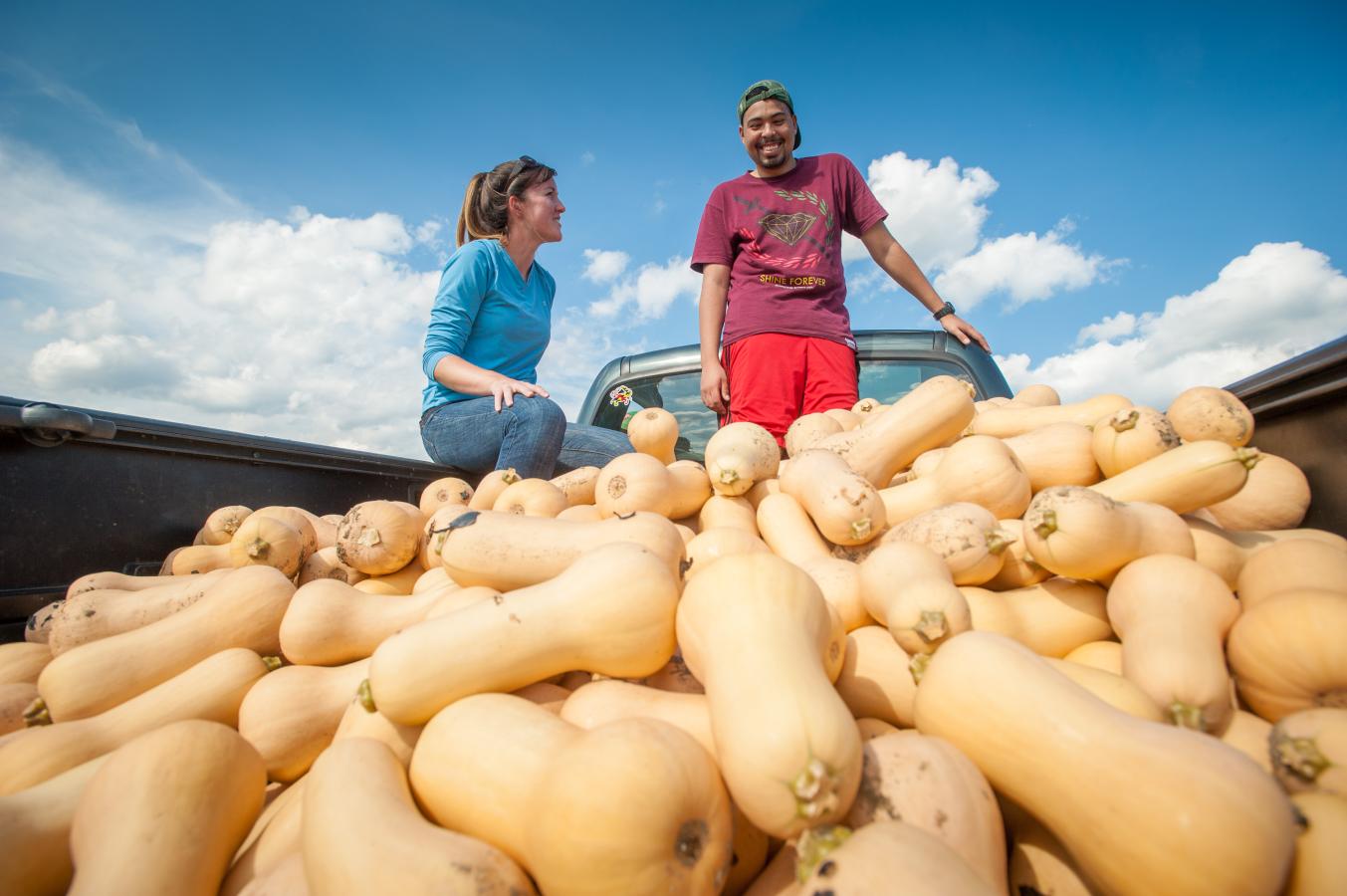 Students in a truck with butternut squash 